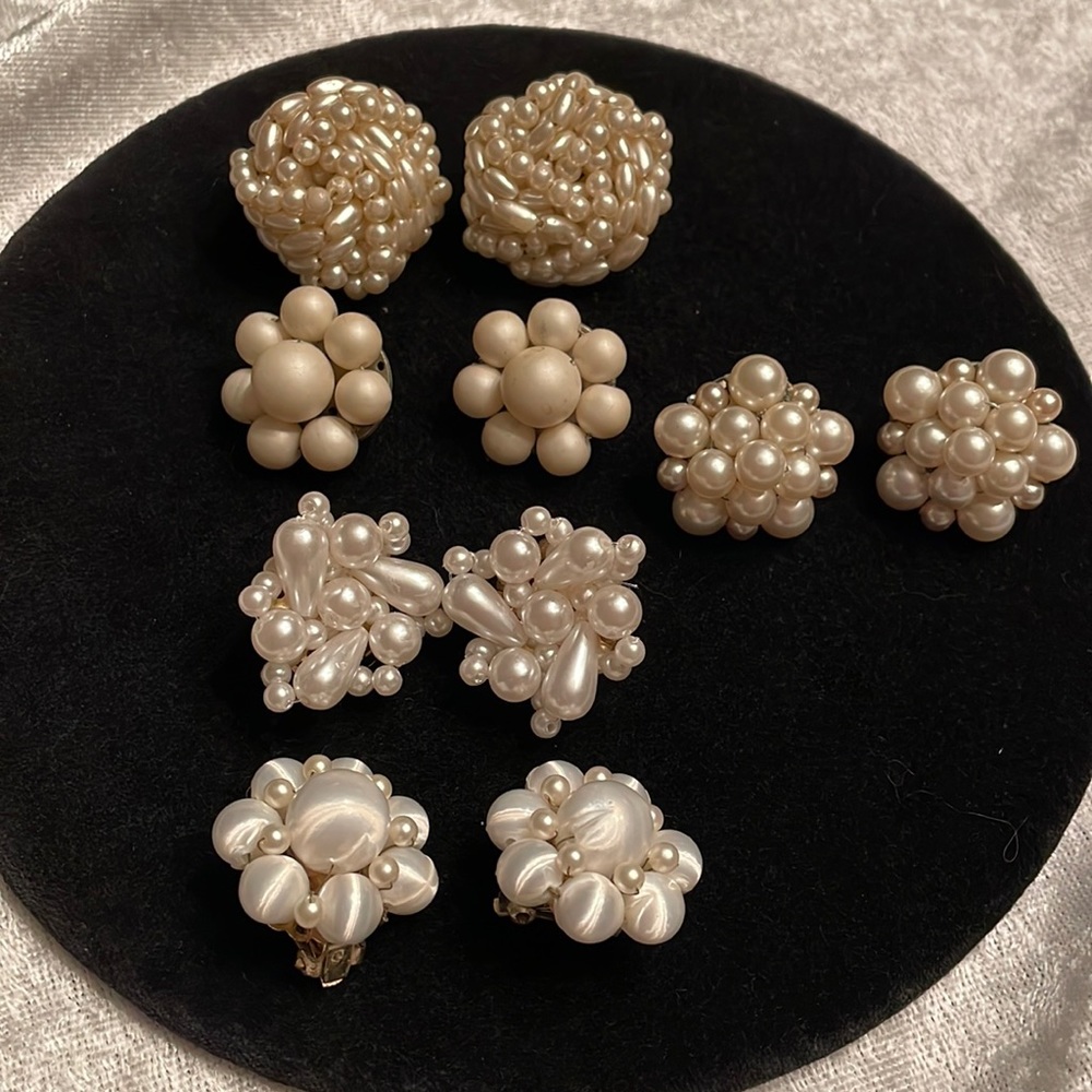 Five pairs of vintage clip on earrings.